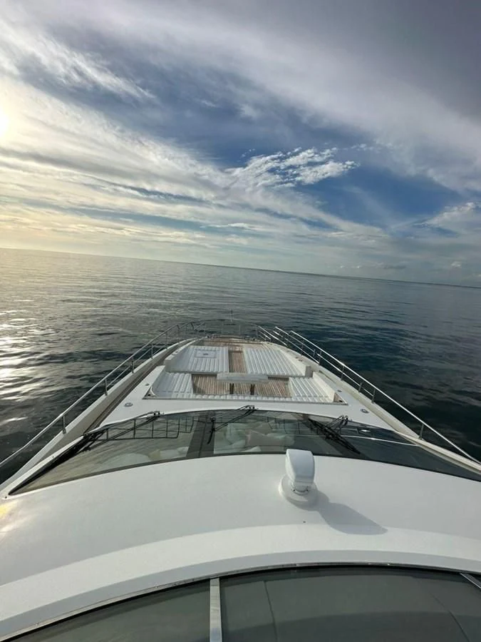 a boat on the water aboard INFINITE VOYAGE III Yacht for Sale