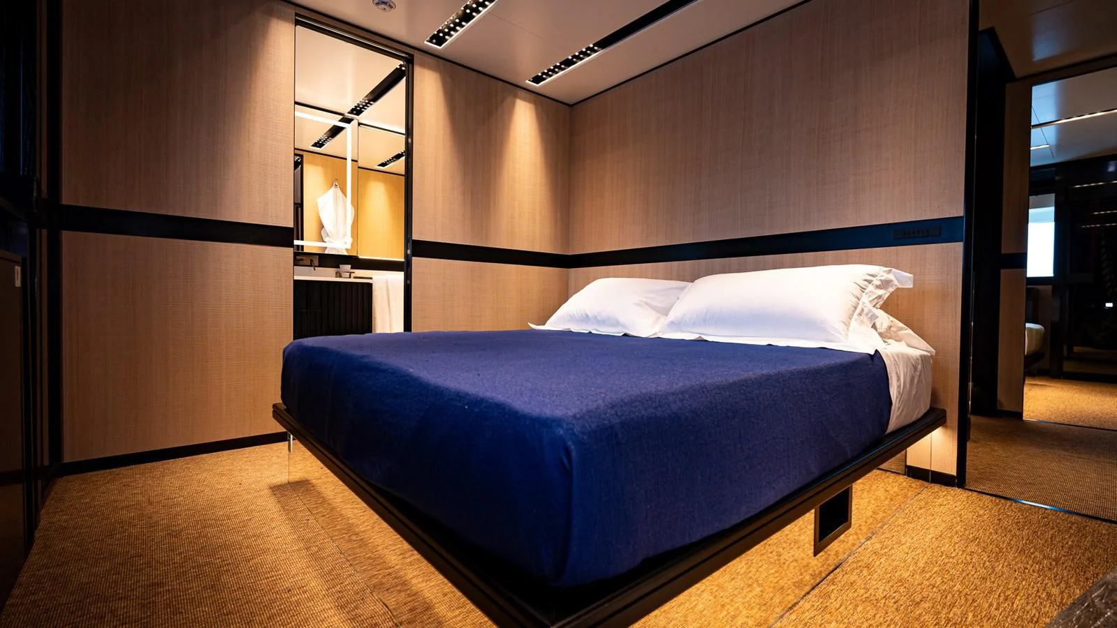a bed in a room aboard EYE OF DESTINY Yacht for Sale