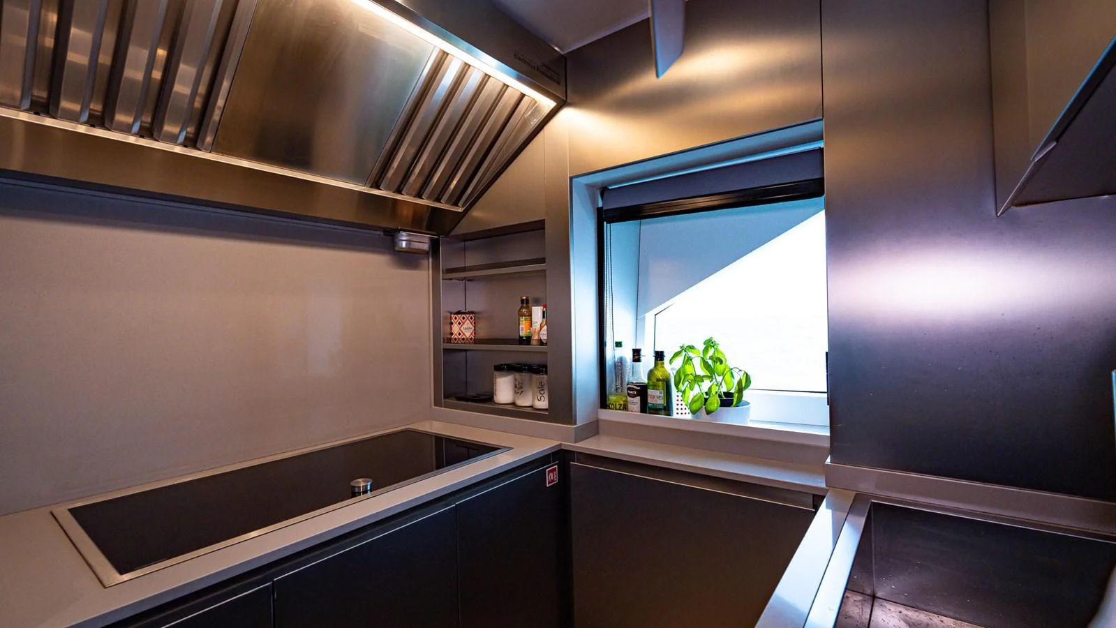 a kitchen with a window aboard EYE OF DESTINY Yacht for Sale