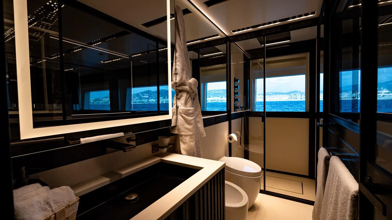 a bathroom with a large window aboard EYE OF DESTINY Yacht for Sale