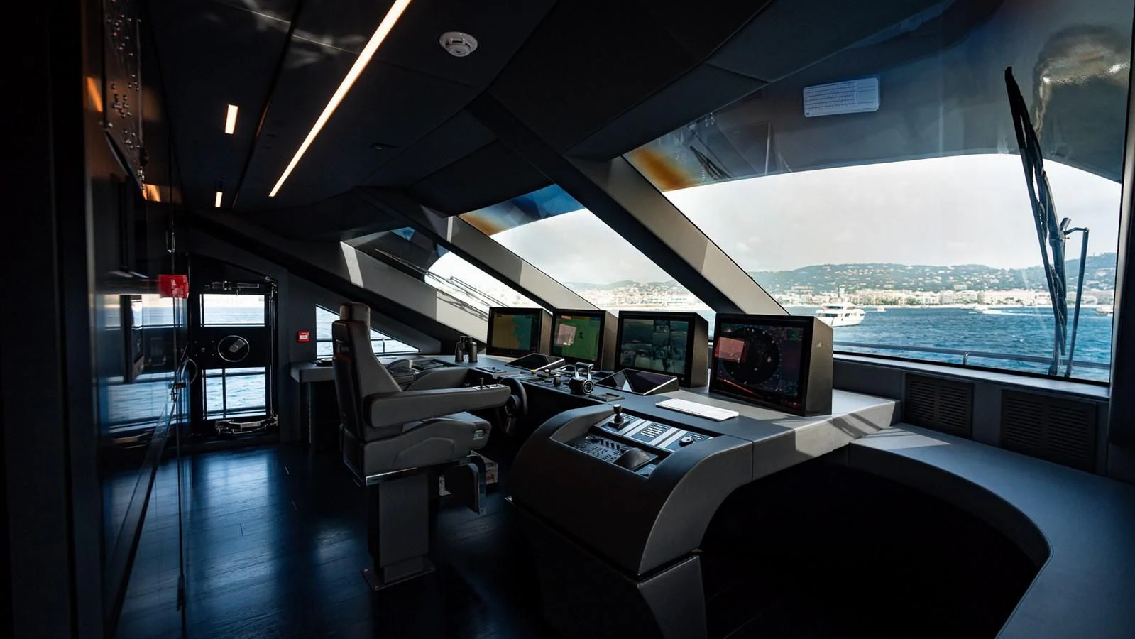 inside of a vehicle with many monitors and computers aboard EYE OF DESTINY Yacht for Sale