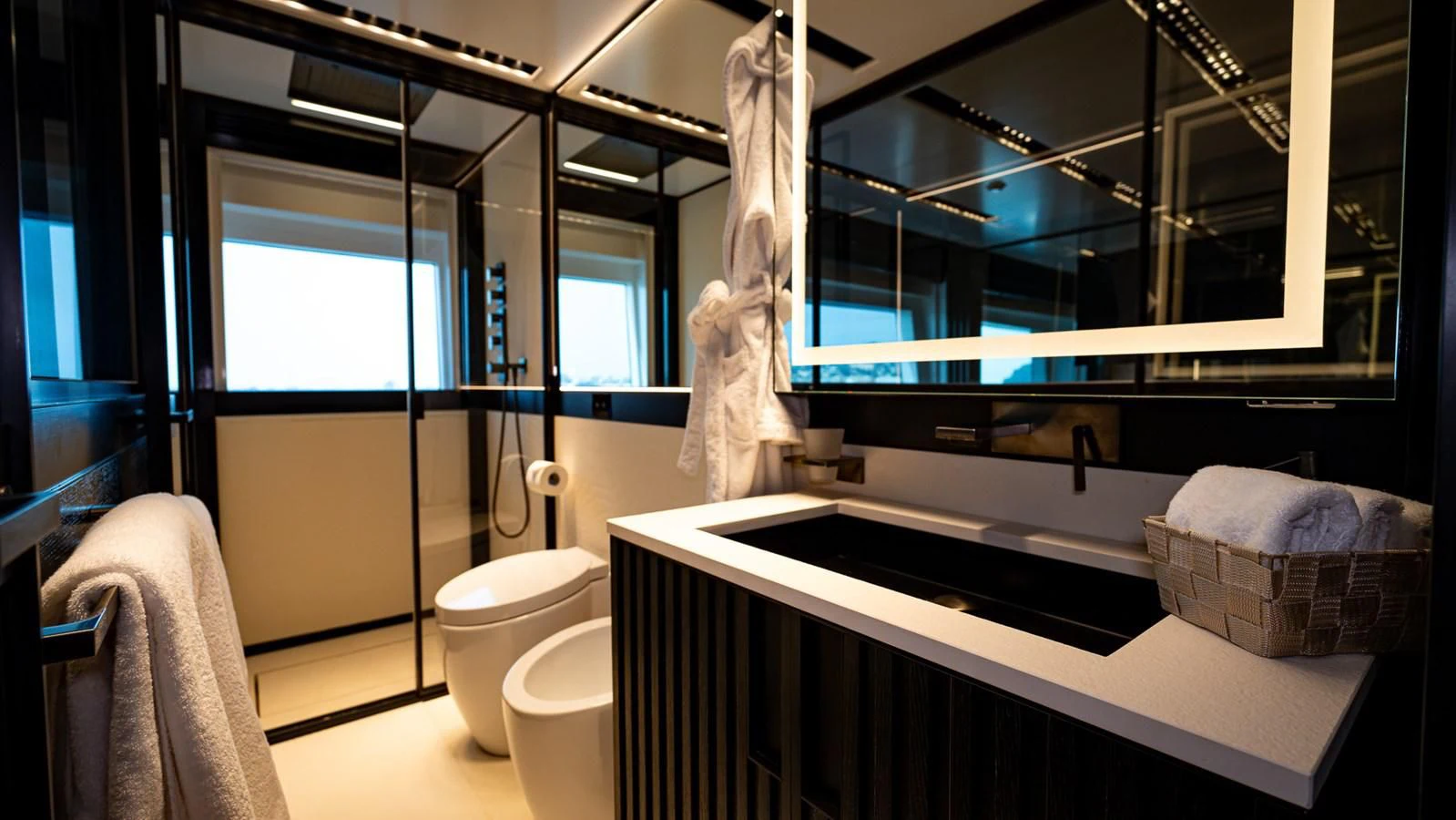 a bathroom with a large mirror aboard EYE OF DESTINY Yacht for Sale