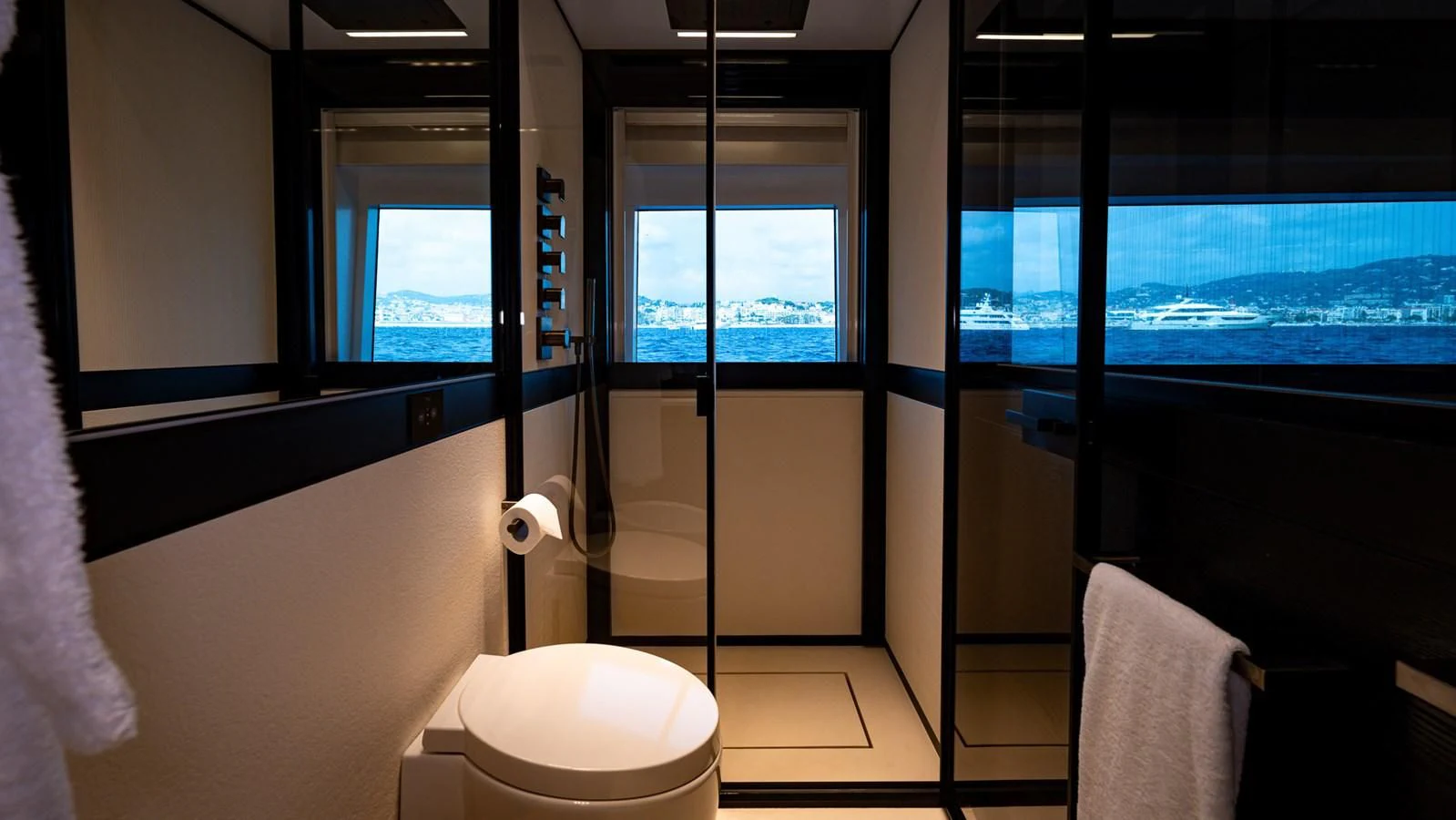 a bathroom with a tub and toilet aboard EYE OF DESTINY Yacht for Sale