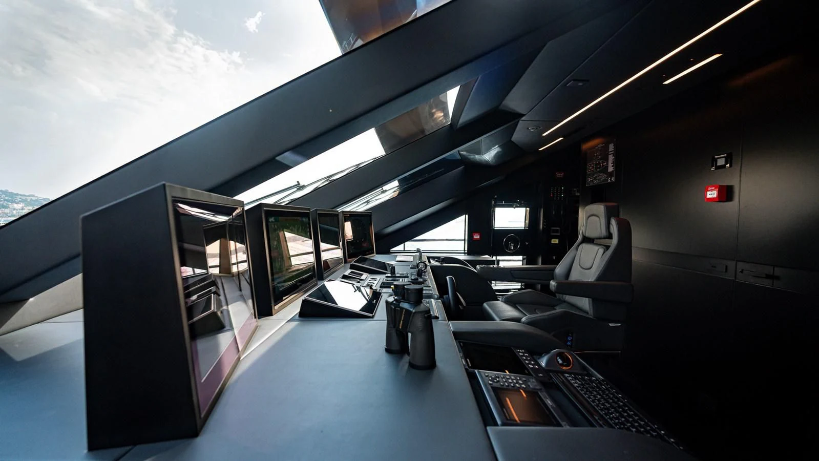 inside of a vehicle with a computer and a large window aboard EYE OF DESTINY Yacht for Sale