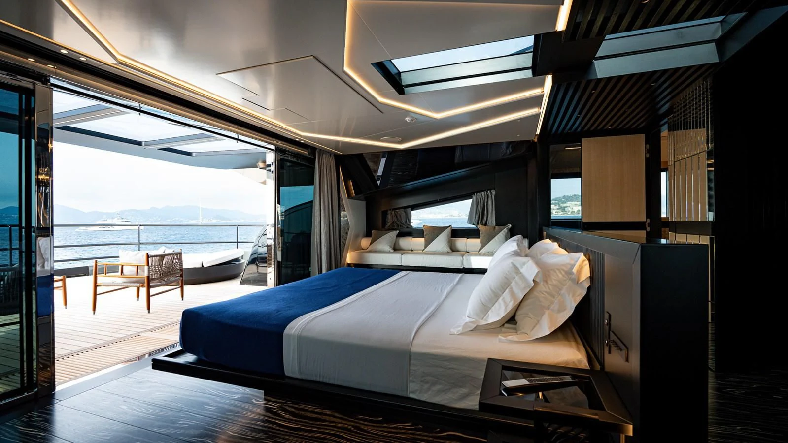a large bed in a room aboard EYE OF DESTINY Yacht for Sale