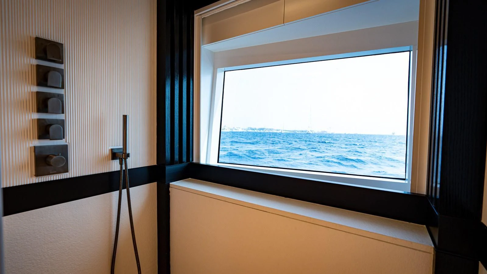 a window with a view of the ocean aboard EYE OF DESTINY Yacht for Sale