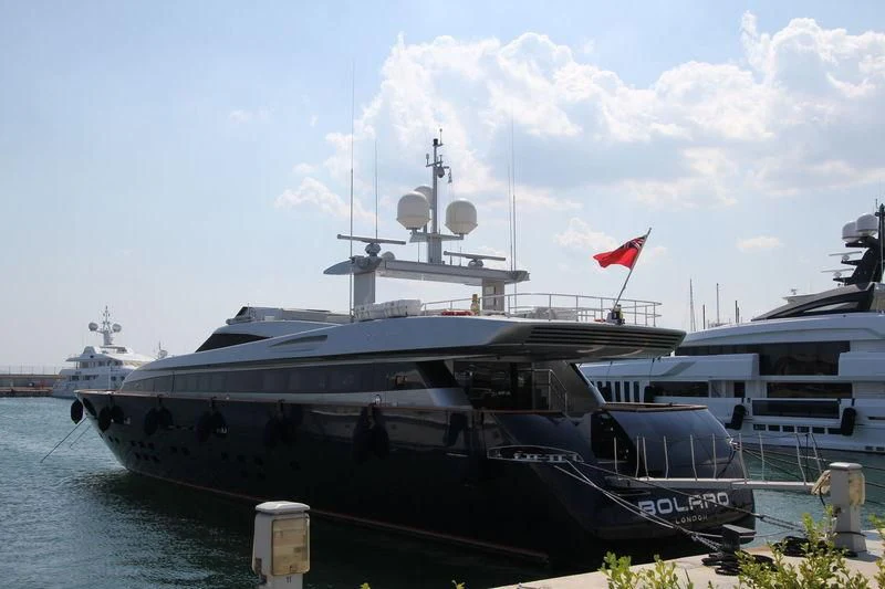 a large ship in the water aboard BOLARO Yacht for Sale