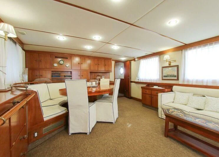 a large kitchen and dining room aboard LA GRANDE DAME Yacht for Sale