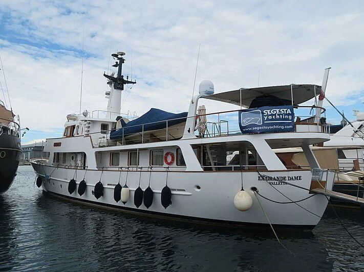 a boat docked at a pier aboard LA GRANDE DAME Yacht for Sale