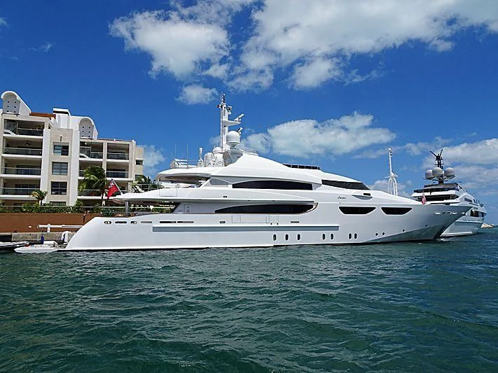 a white yacht in the water aboard CACIQUE Yacht for Sale