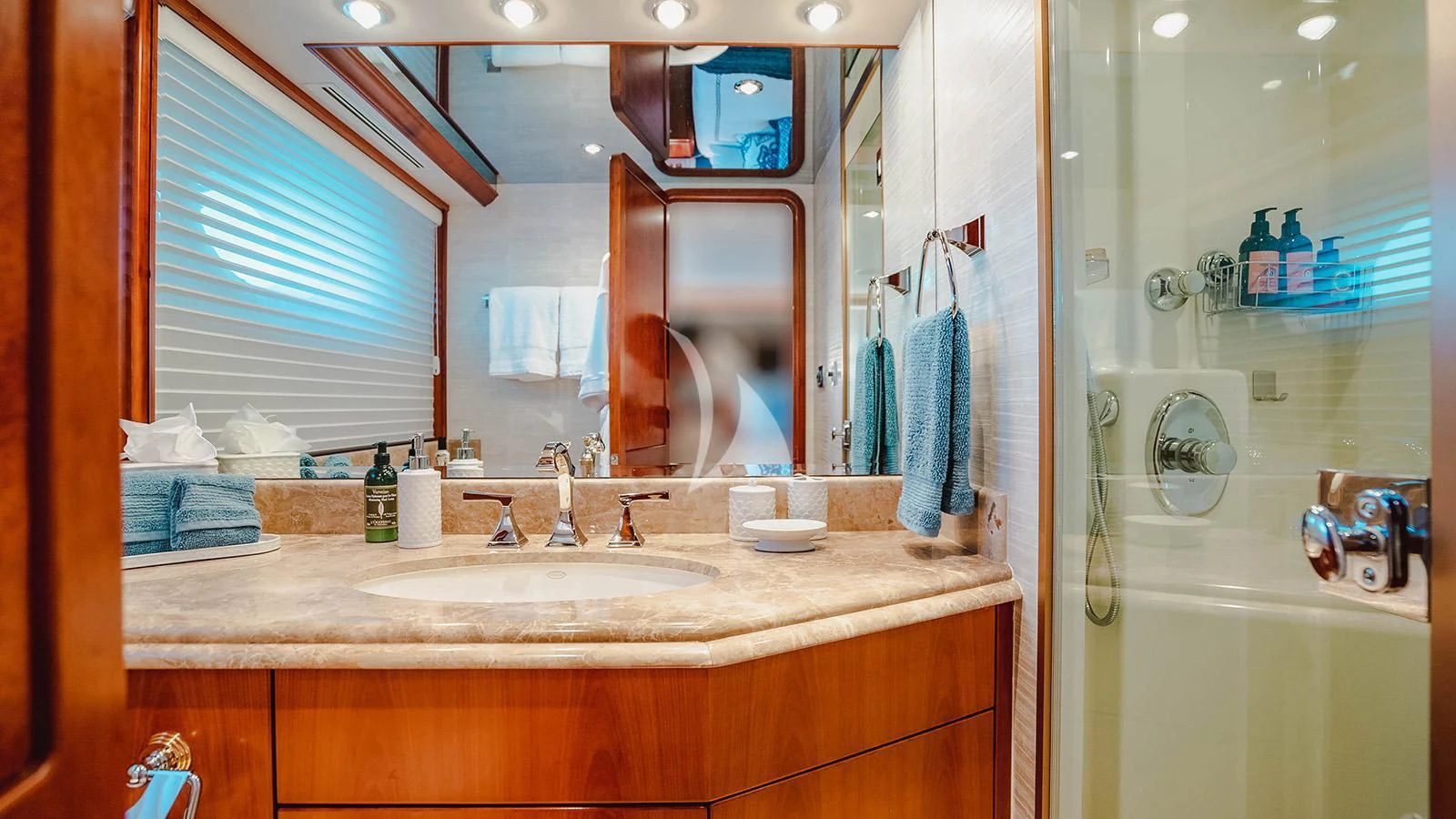 a bathroom with a large mirror aboard LA LADY Yacht for Sale