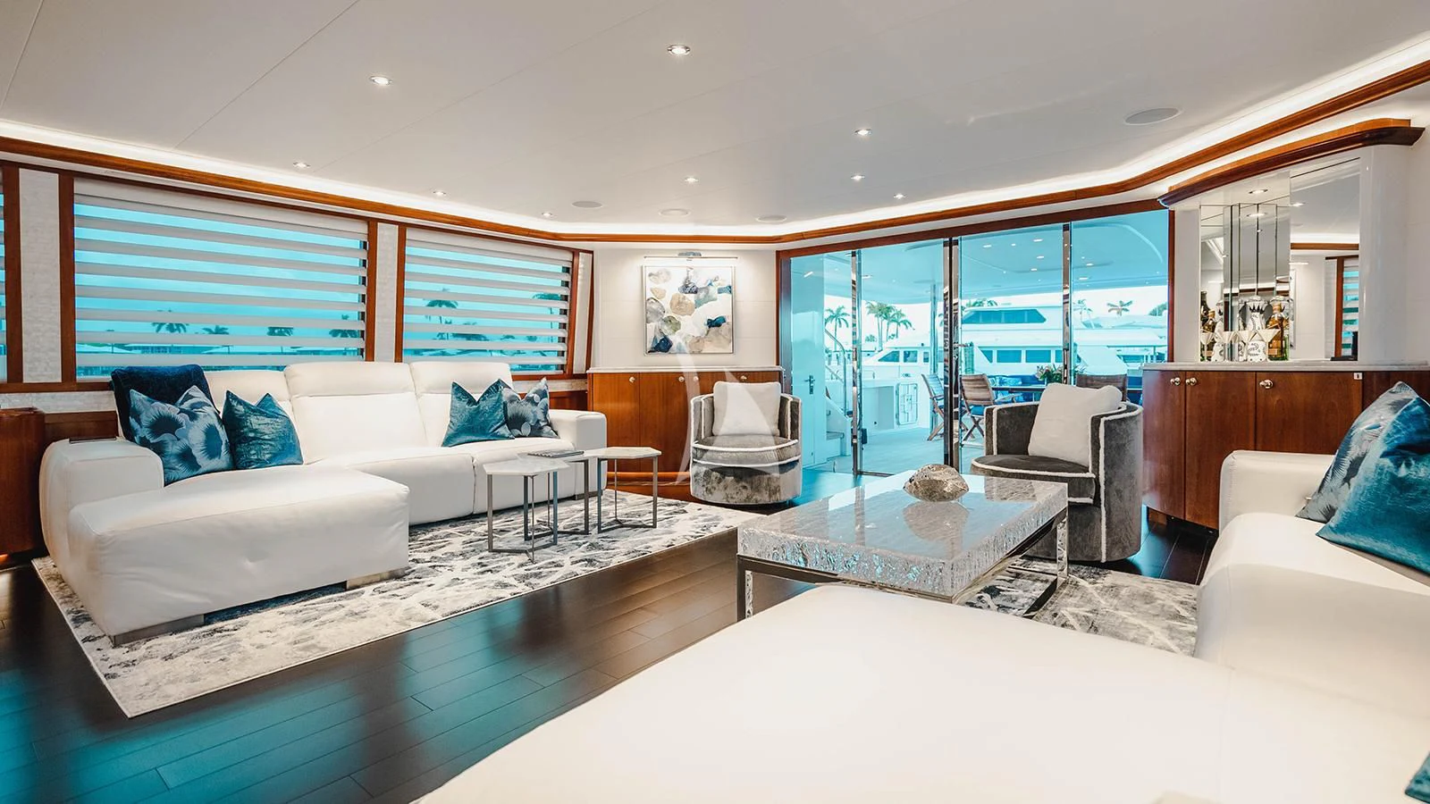 a living room with a large glass window aboard LA LADY Yacht for Sale