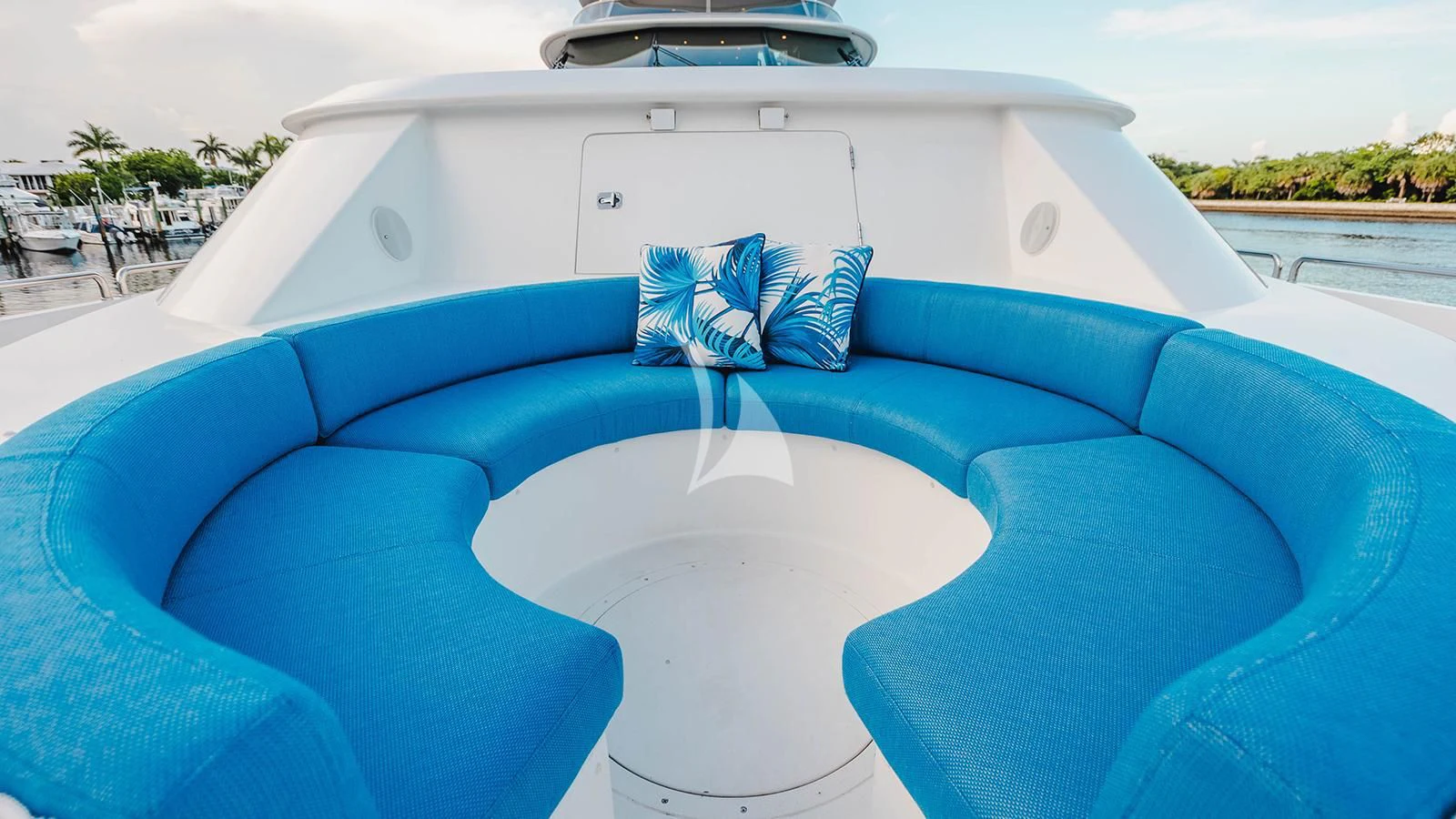 a white car with a blue seat aboard LA LADY Yacht for Sale