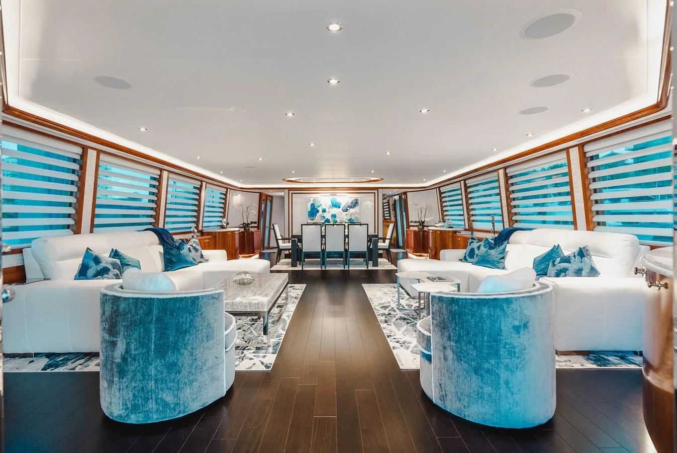a room with a couch and a table and chairs aboard LA LADY Yacht for Sale