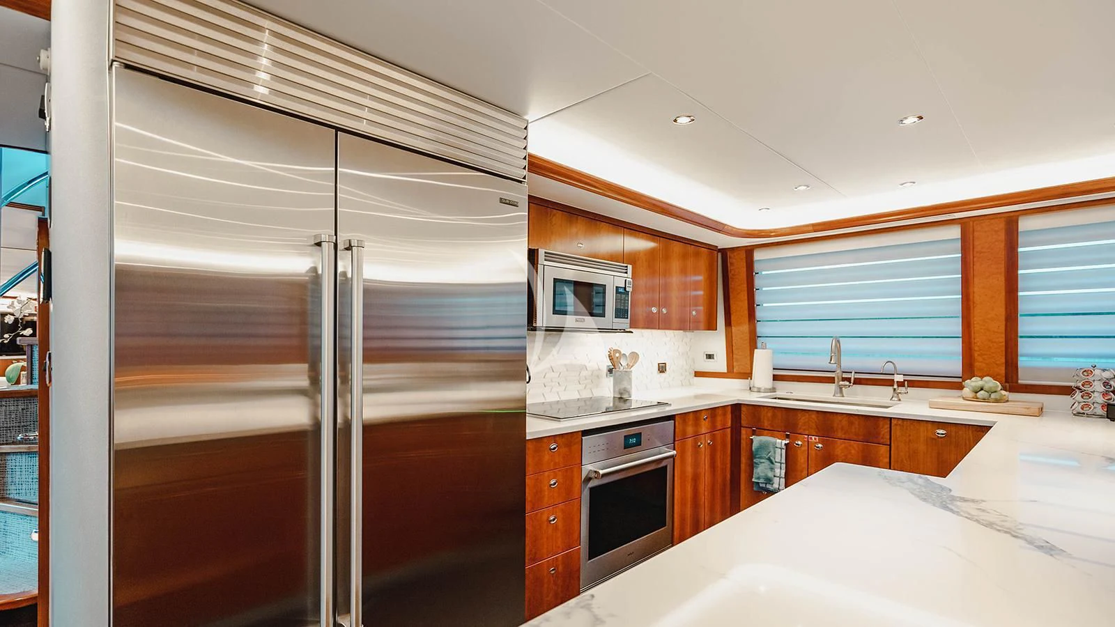 a kitchen with a microwave oven aboard LA LADY Yacht for Sale