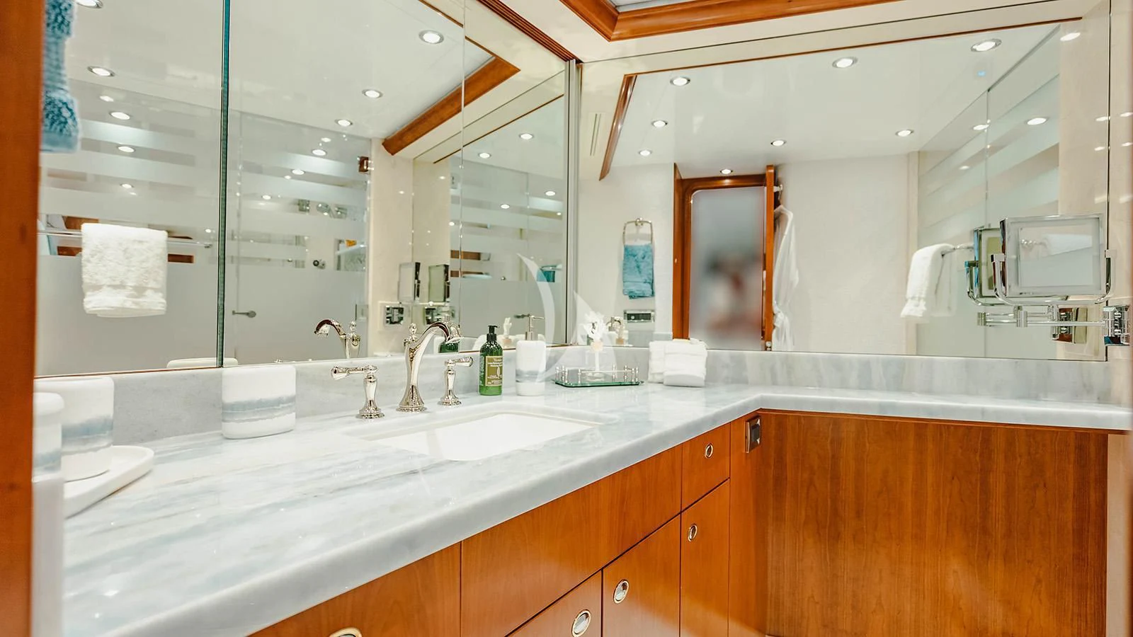 a bathroom with a large mirror aboard LA LADY Yacht for Sale