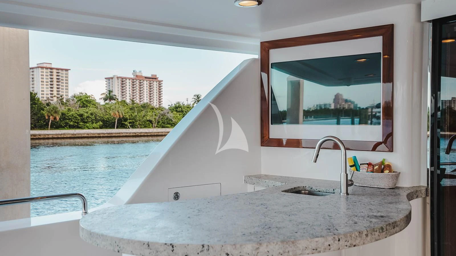 a large white bathtub with a sink and a window aboard LA LADY Yacht for Sale