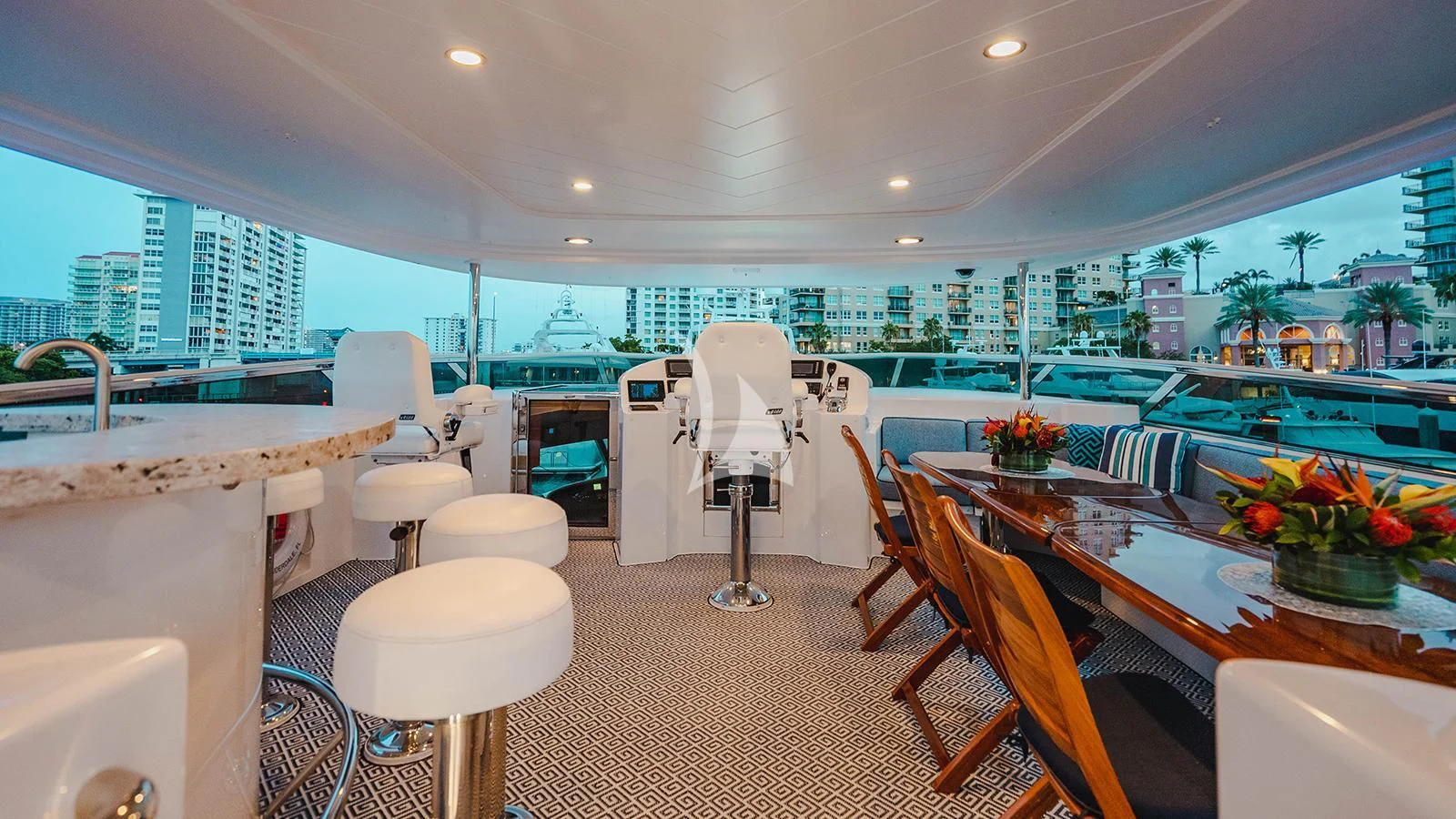 a large kitchen with a large window aboard LA LADY Yacht for Sale