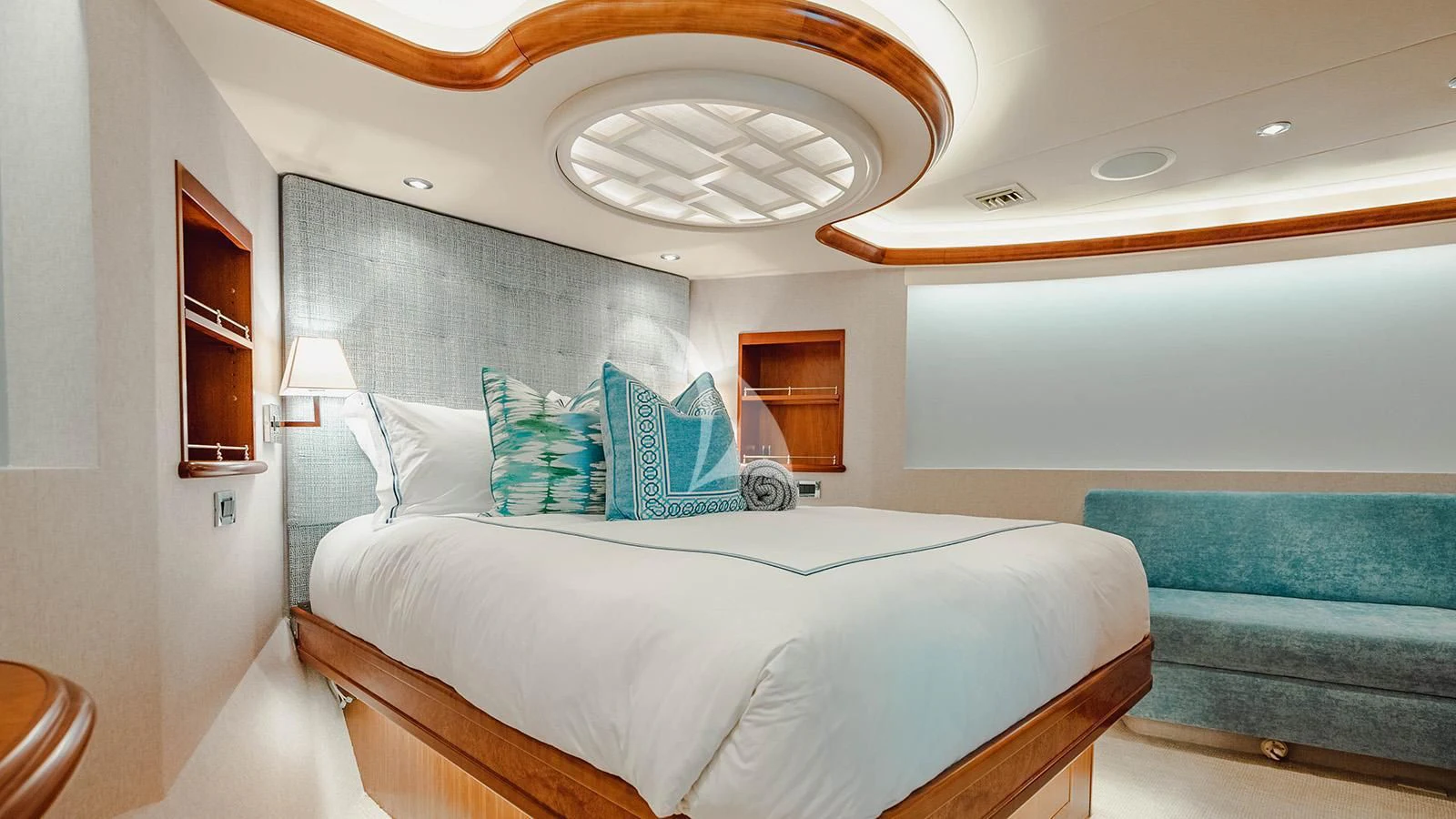 a room with a bed and a couch aboard LA LADY Yacht for Sale