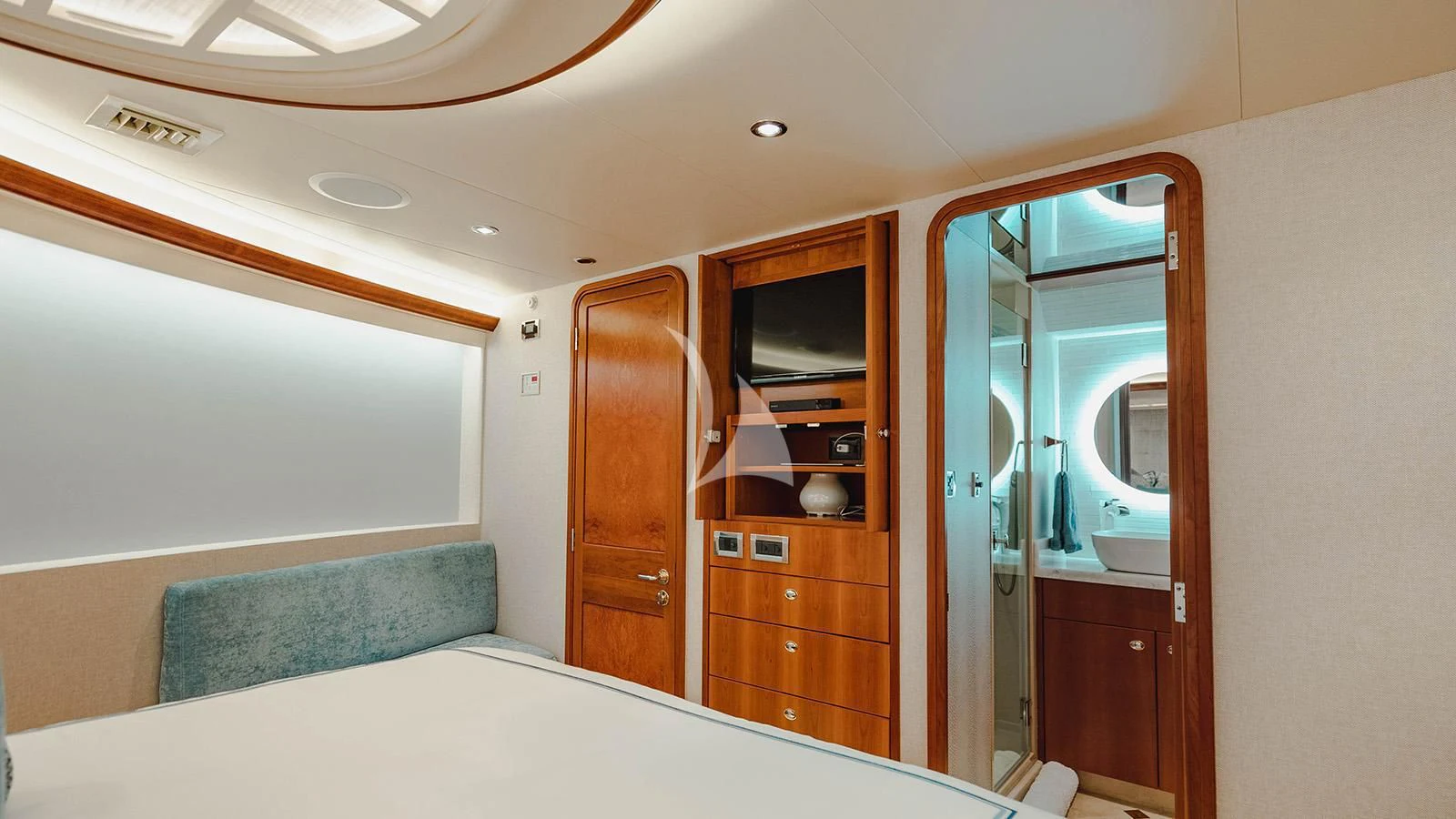a bedroom with a bed and a closet aboard LA LADY Yacht for Sale