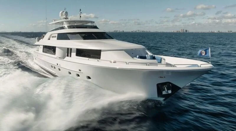 a white yacht on the water aboard LA LADY Yacht for Sale