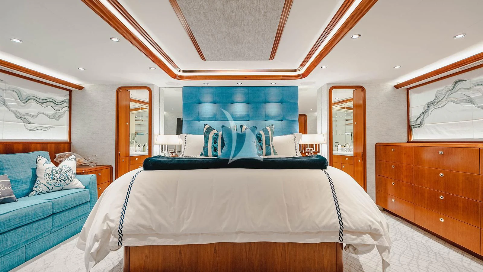 a room with a bed and a blue bed aboard LA LADY Yacht for Sale