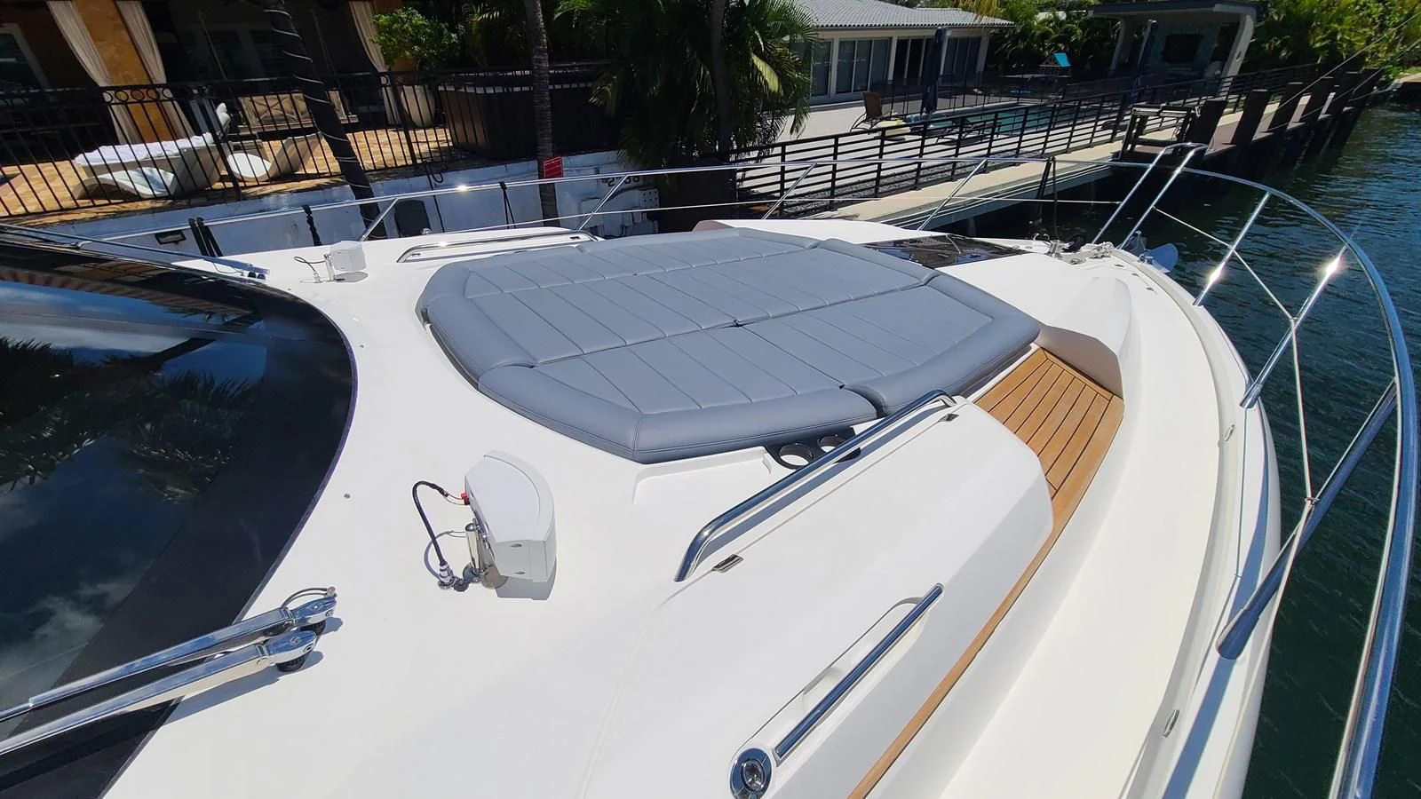a white boat in a body of water aboard PREDATOR 68 Yacht for Sale