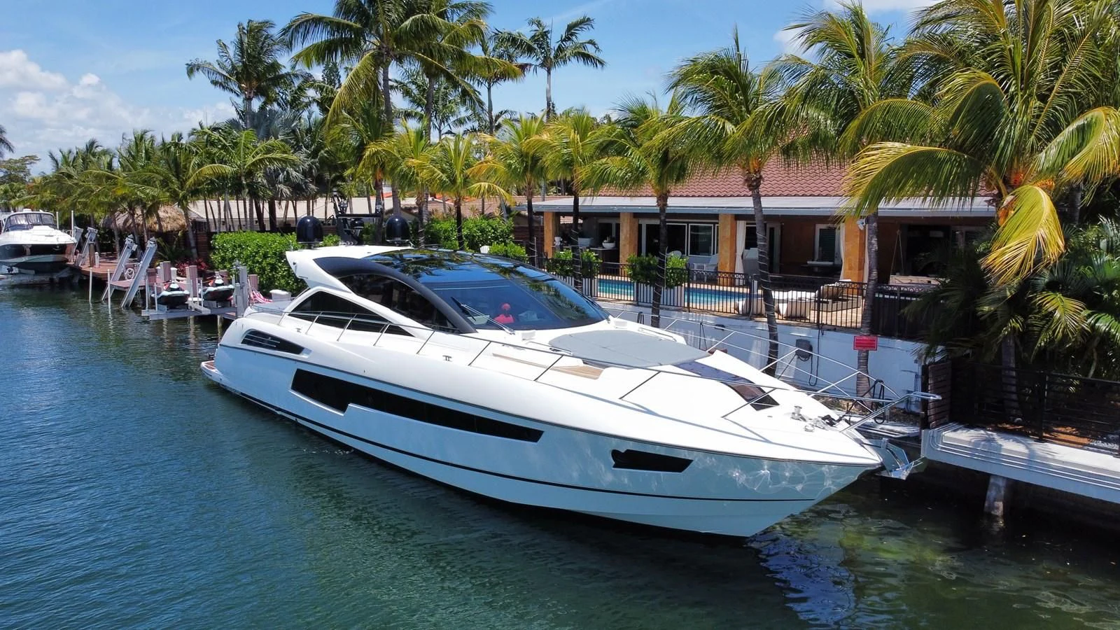 a boat docked at a pier aboard PREDATOR 68 Yacht for Sale