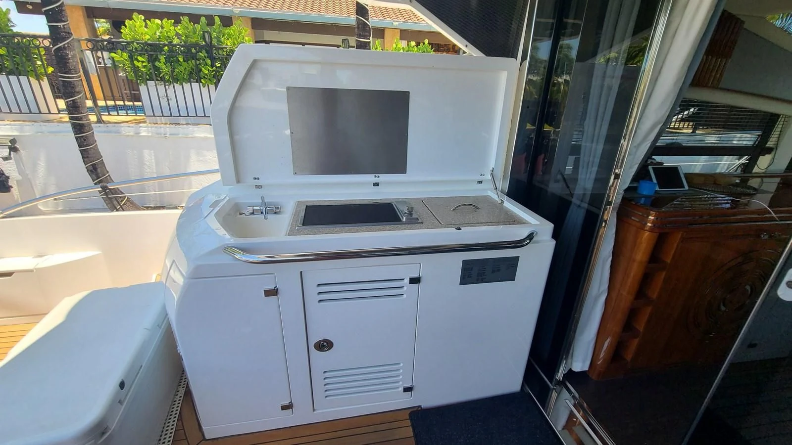 a white machine with a vent on top aboard PREDATOR 68 Yacht for Sale