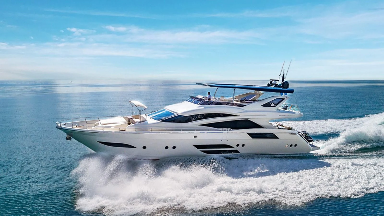 a white yacht on the water aboard GOLDEN 3 Yacht for Sale