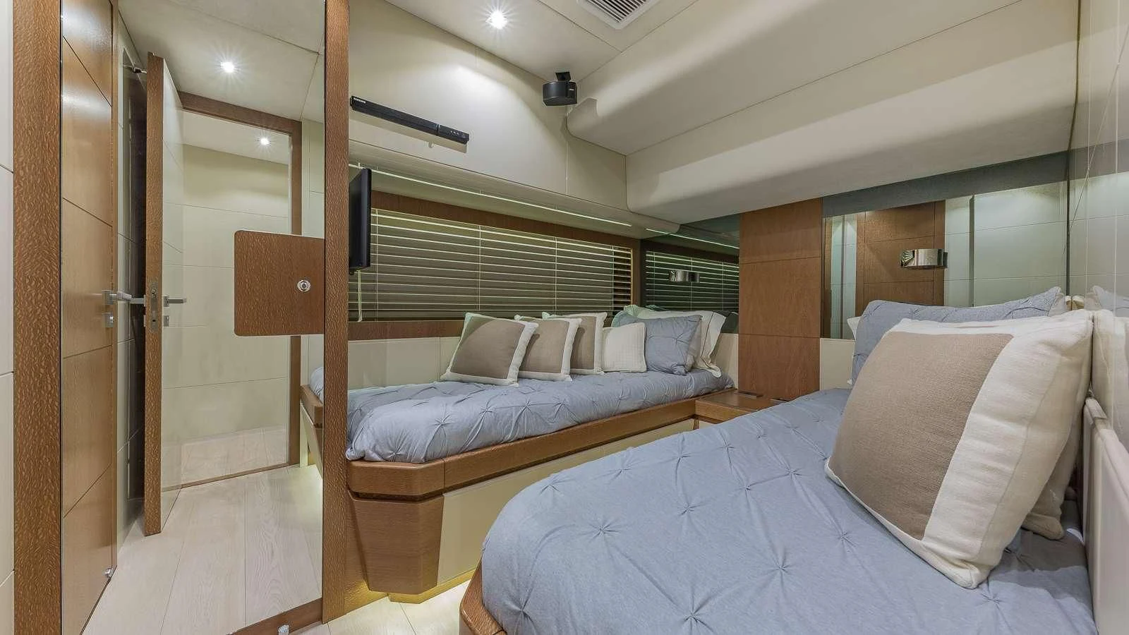 a room with two beds aboard GOLDEN 3 Yacht for Sale