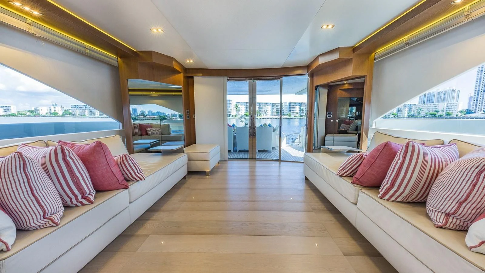 a room with a view of the ocean and the city aboard GOLDEN 3 Yacht for Sale