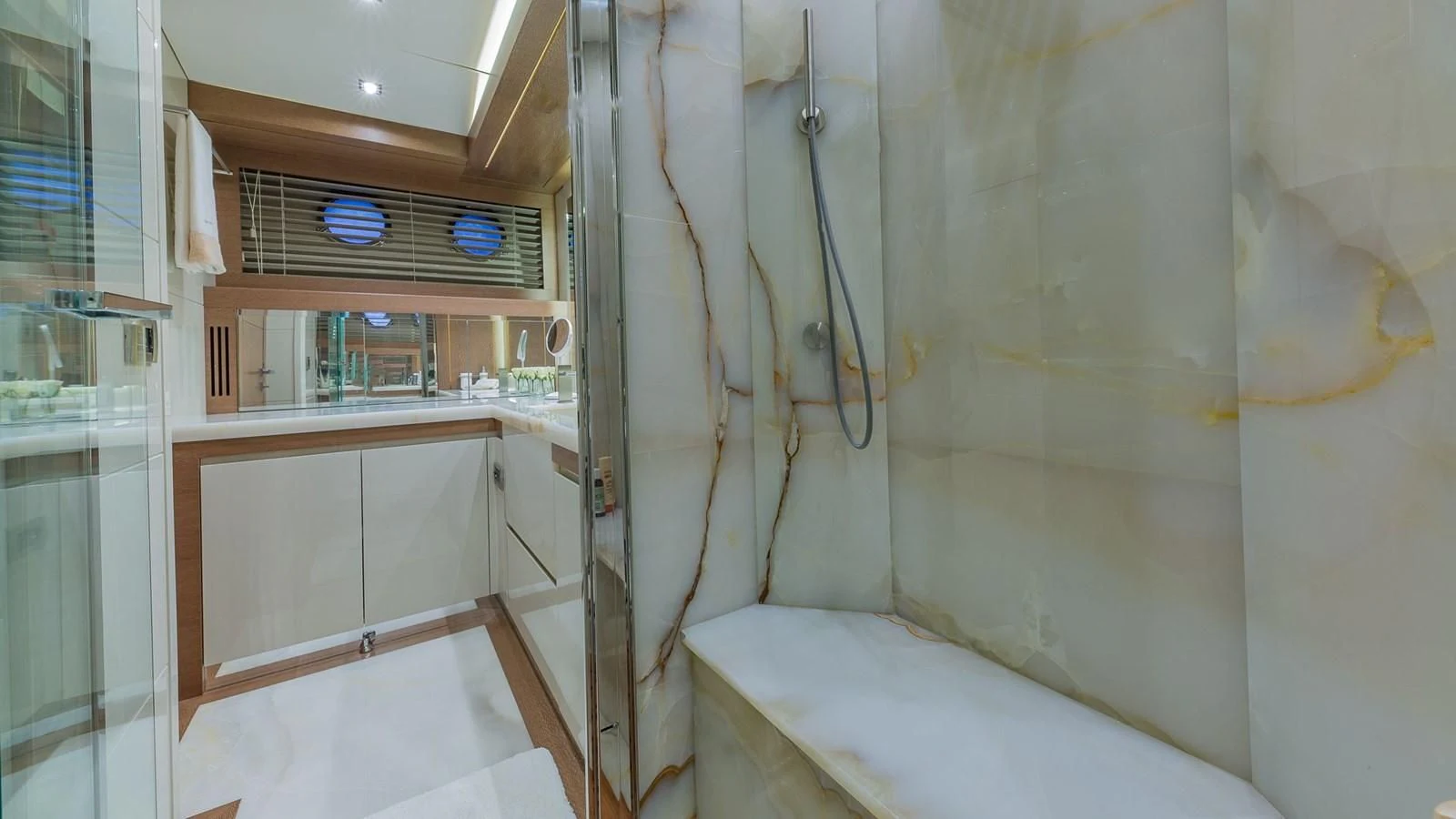 a room with a bed and a window aboard GOLDEN 3 Yacht for Sale