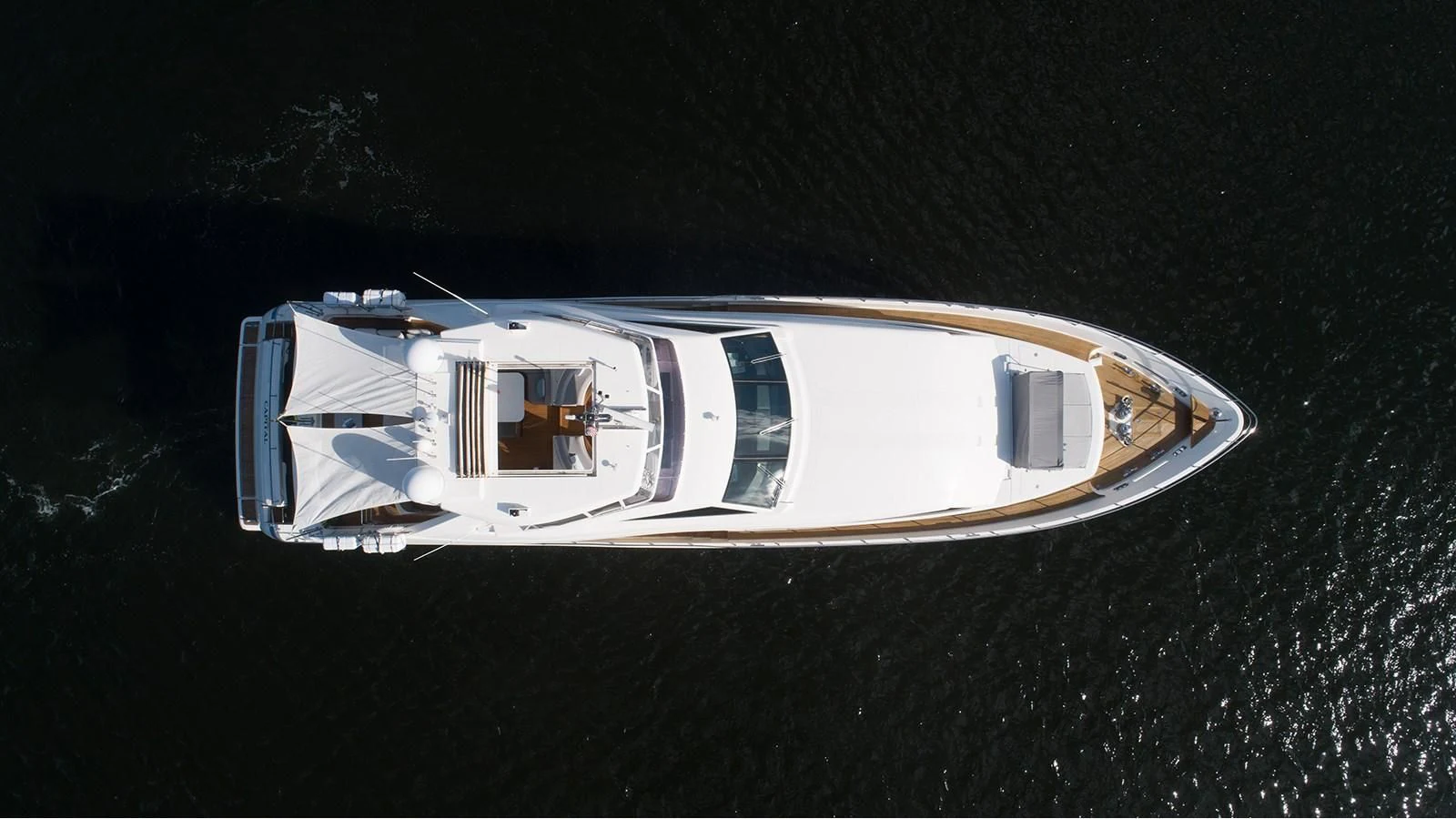 a white car with a broken window aboard PATRON Yacht for Sale