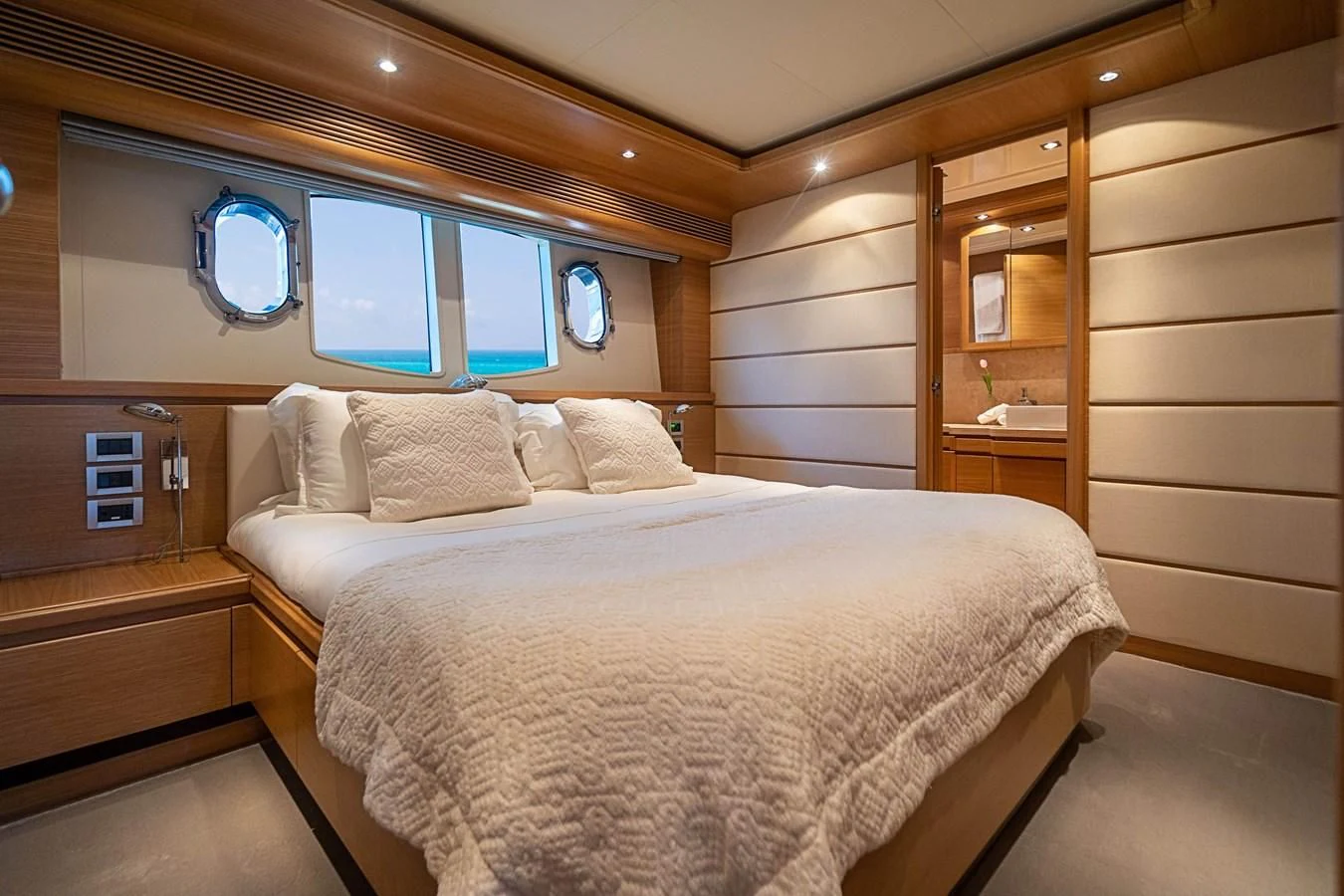a bed in a cabin aboard PATRON Yacht for Sale