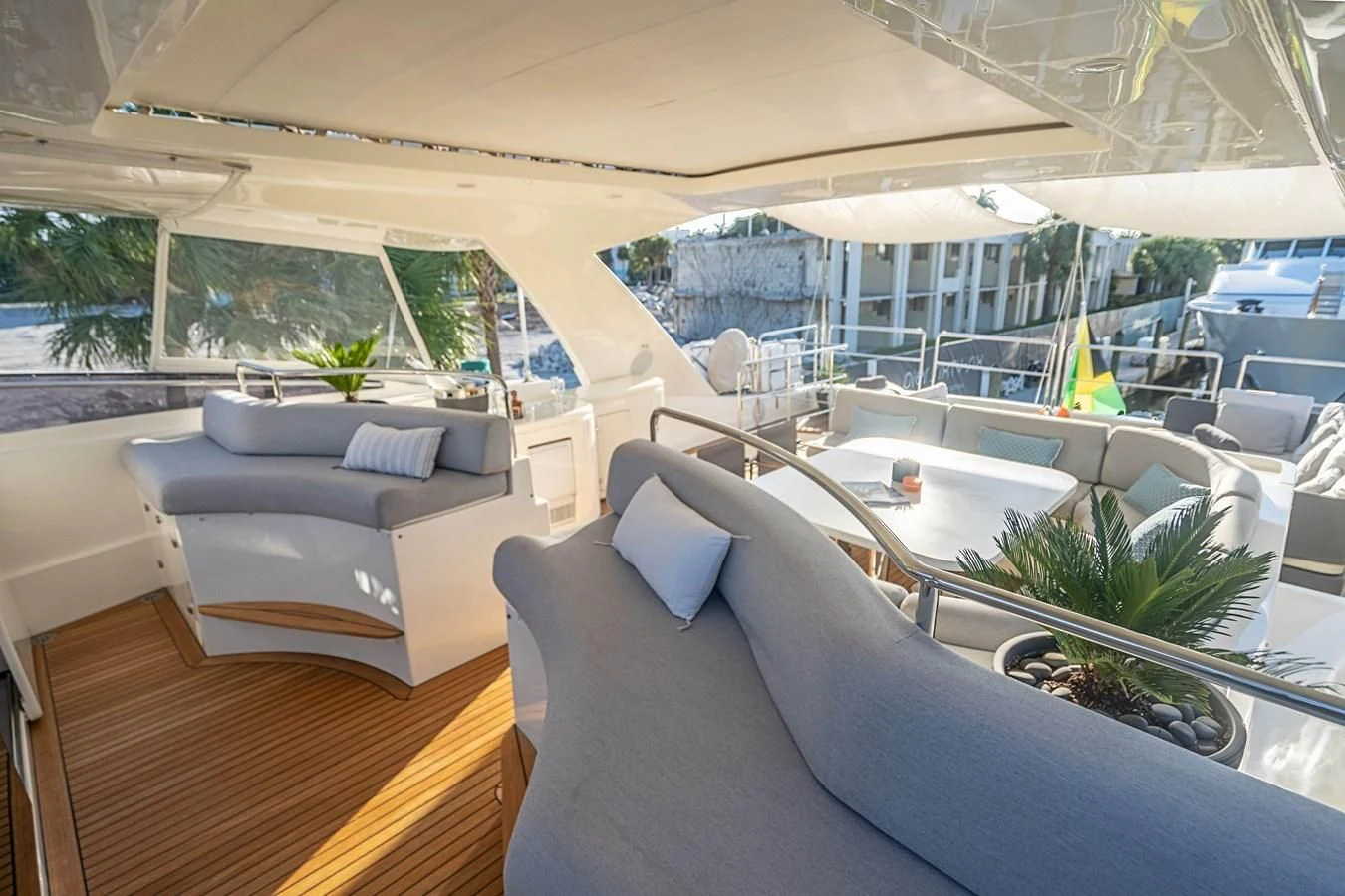 a room with a couch and a pool aboard PATRON Yacht for Sale
