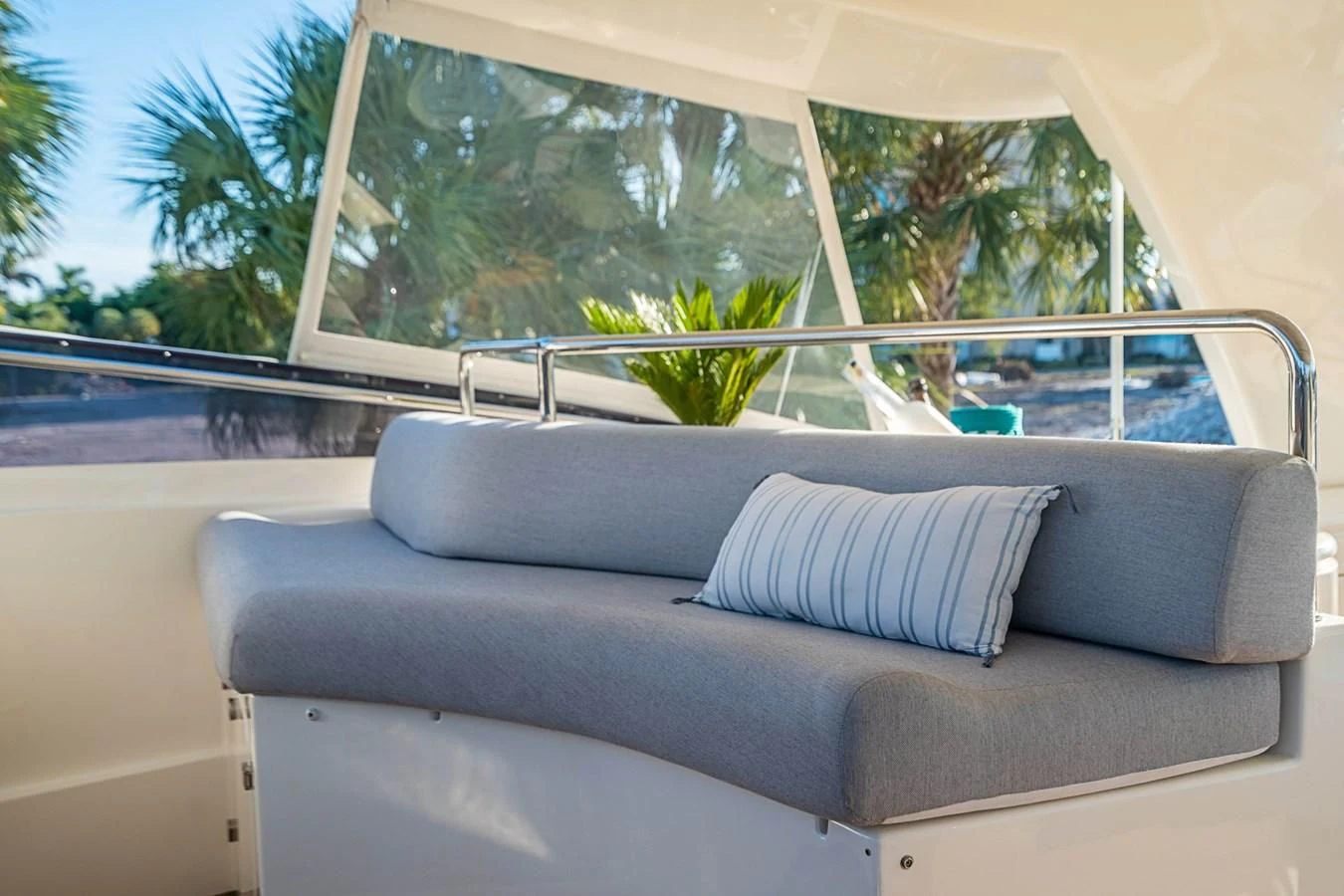 a couch in a room aboard PATRON Yacht for Sale