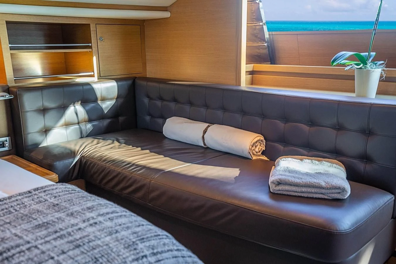 a modern looking living room aboard PATRON Yacht for Sale