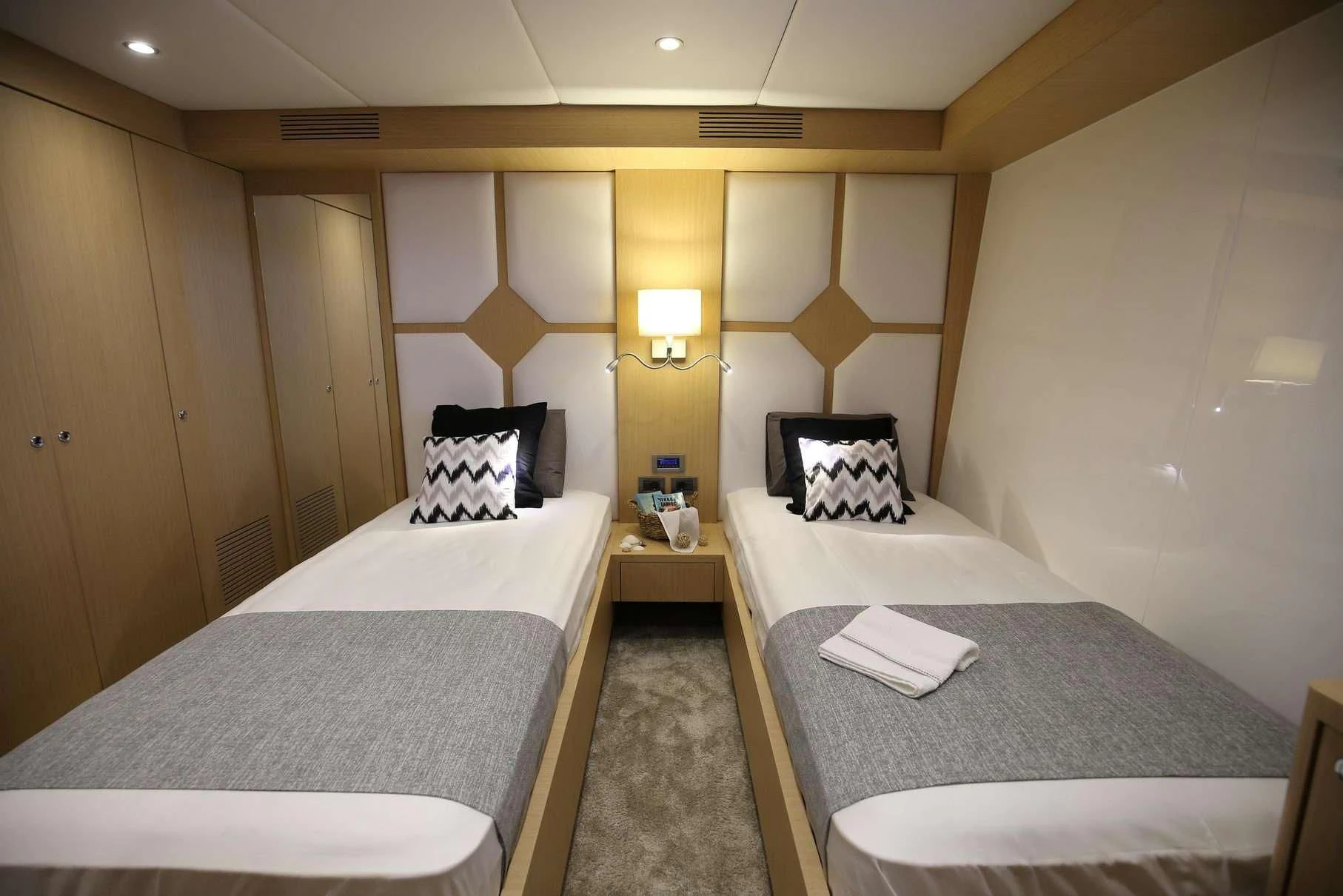 a hotel room with two beds aboard OTTAWA IV Yacht for Sale