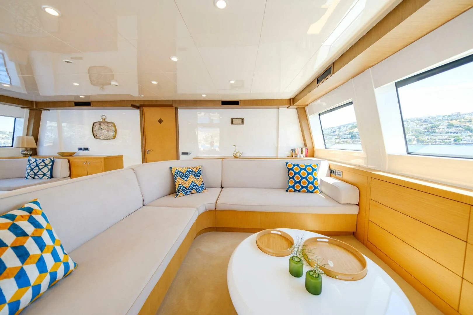 a living room with a couch and a table aboard OTTAWA IV Yacht for Sale