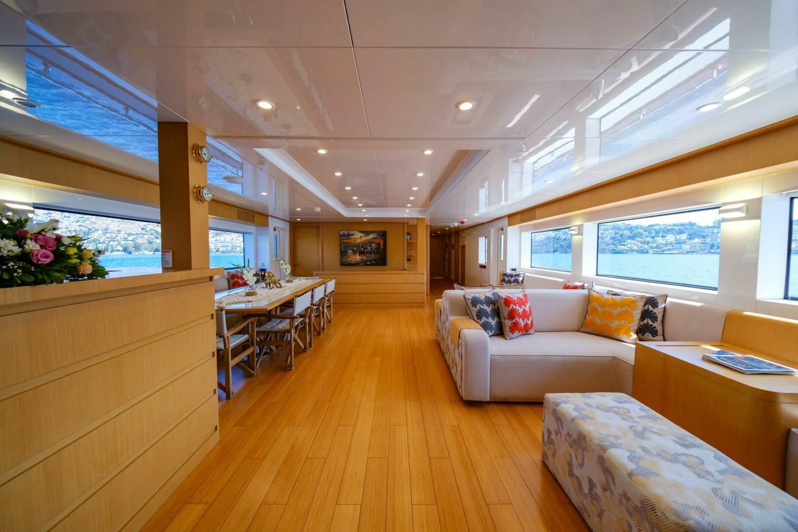 a living room with a couch and a table aboard OTTAWA IV Yacht for Sale