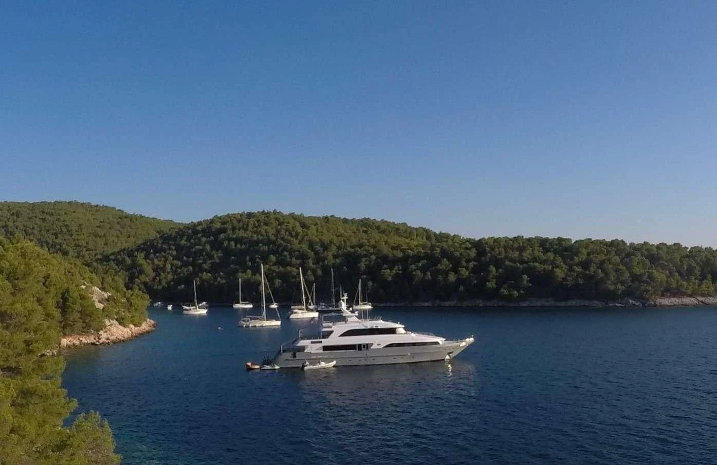 a group of boats on a body of water aboard OTTAWA IV Yacht for Sale