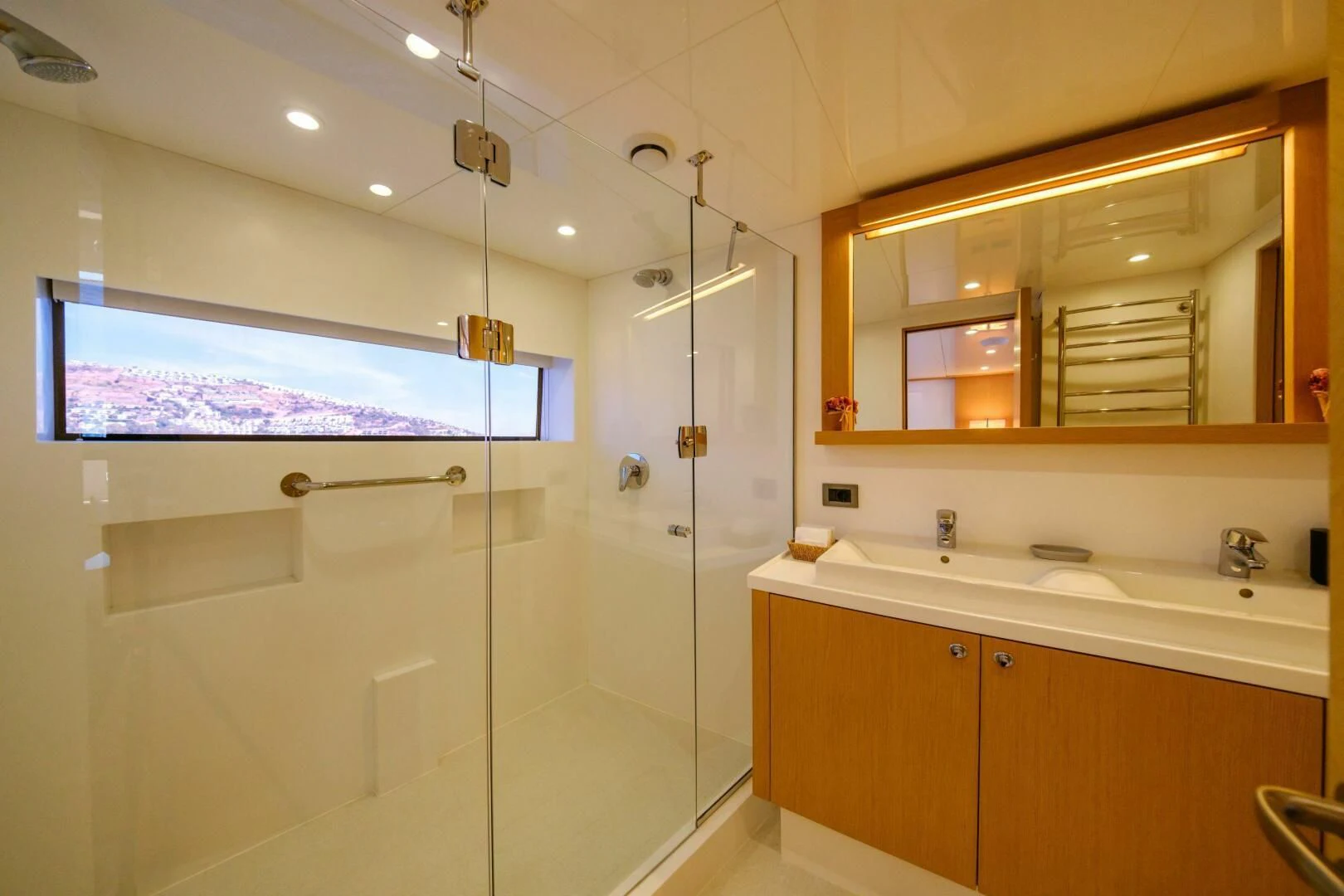 a bathroom with a shower unit and sink aboard OTTAWA IV Yacht for Sale