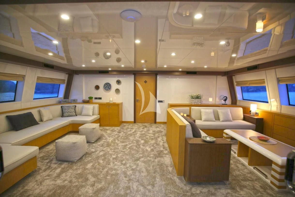 a large living room with a large open floor plan aboard OTTAWA IV Yacht for Sale