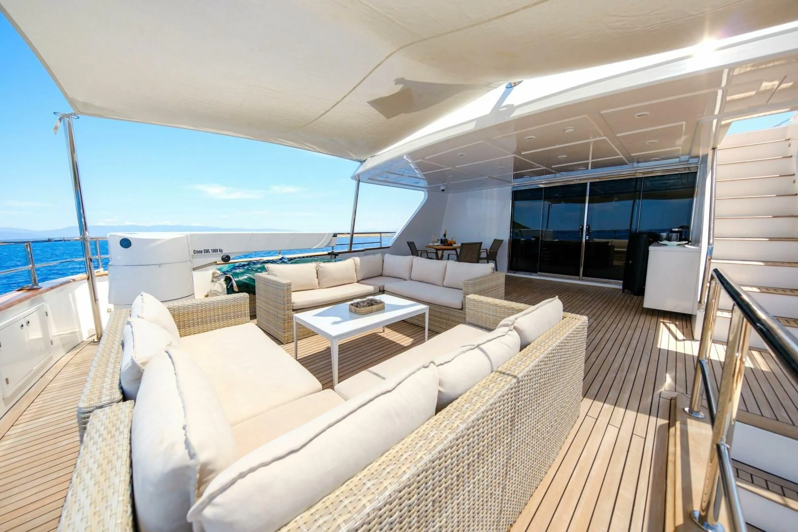 a room with a couch and a pool aboard OTTAWA IV Yacht for Sale
