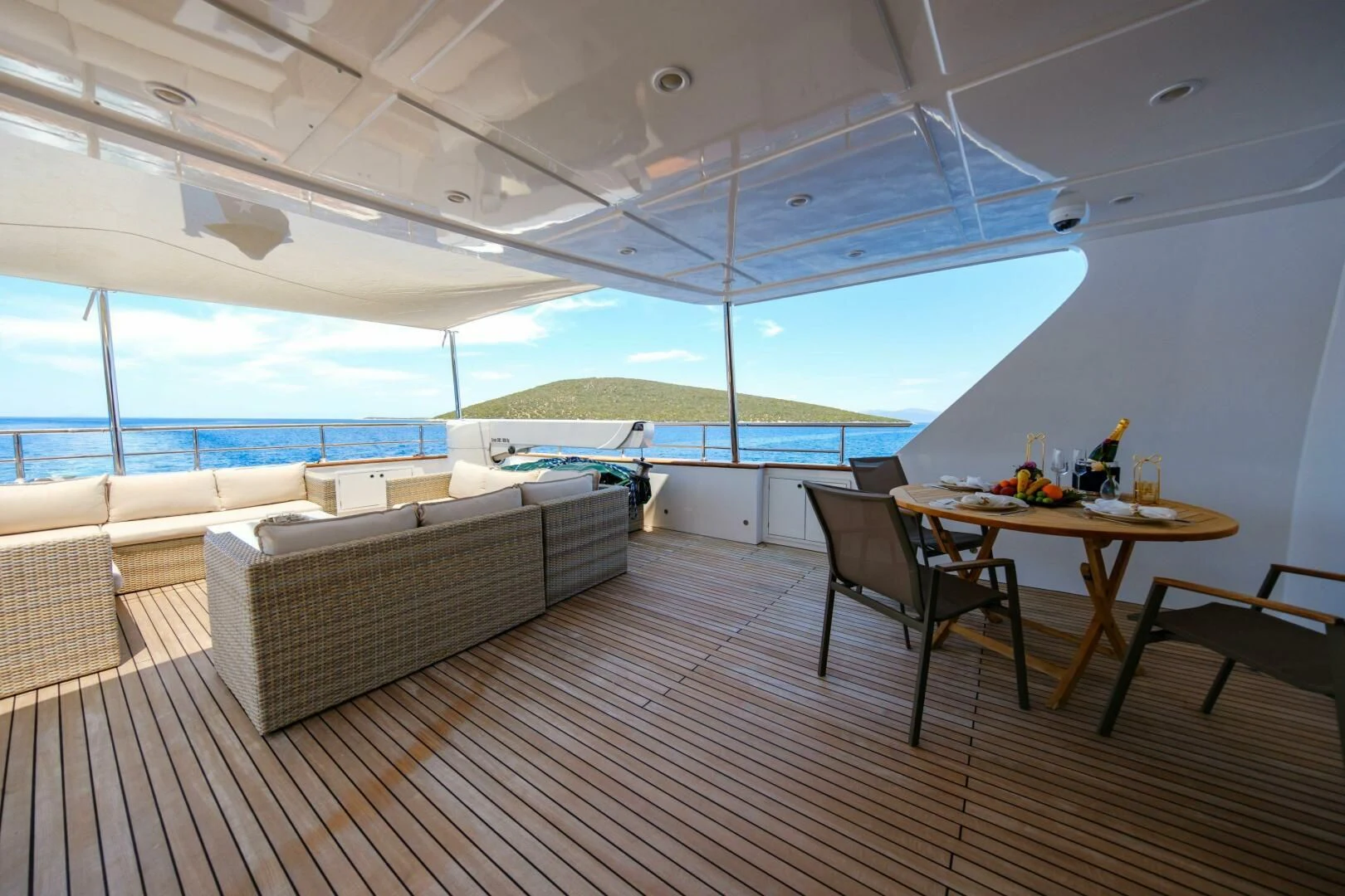 a room with a couch and a table and a pool aboard OTTAWA IV Yacht for Sale