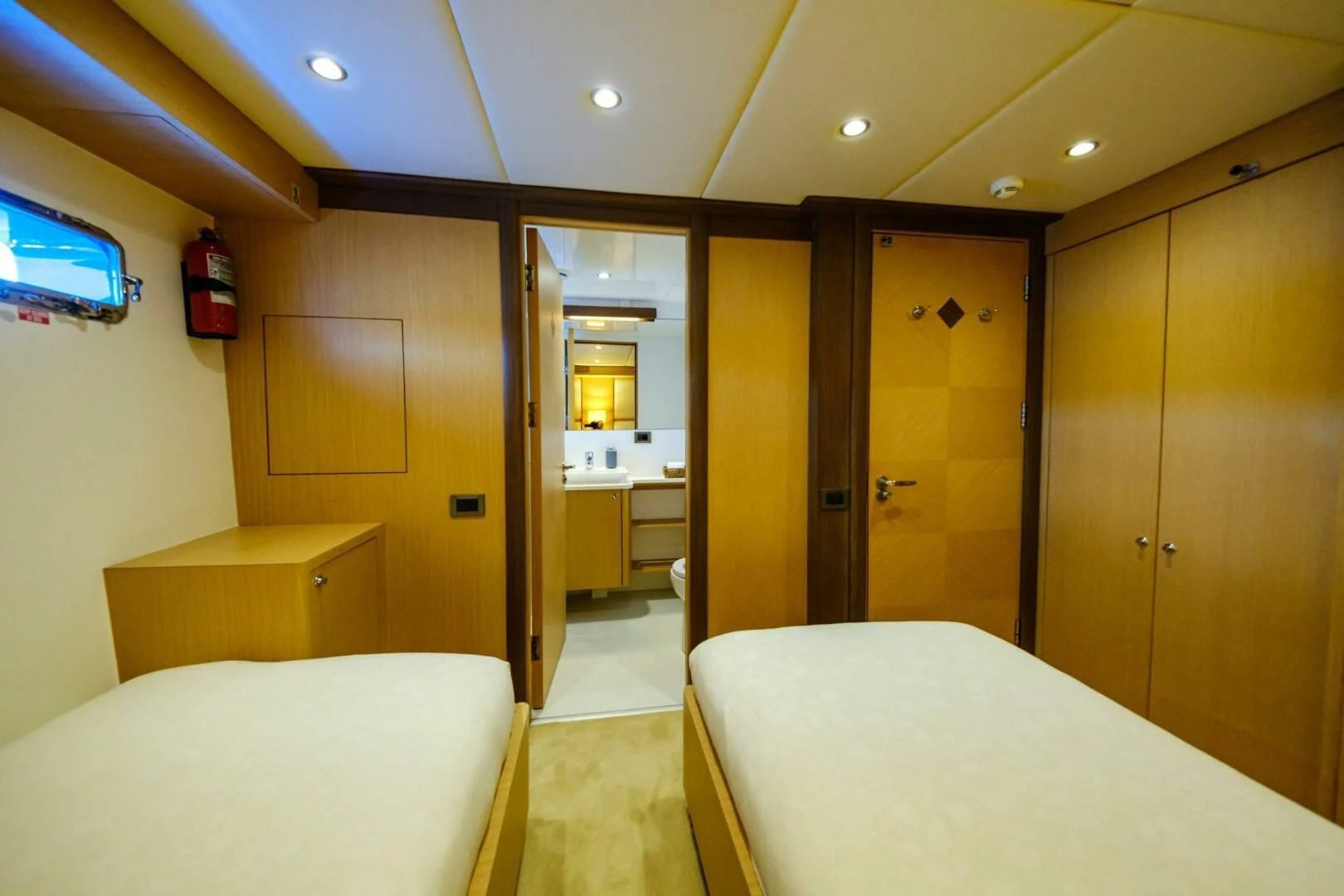 a room with a bed and a desk aboard OTTAWA IV Yacht for Sale