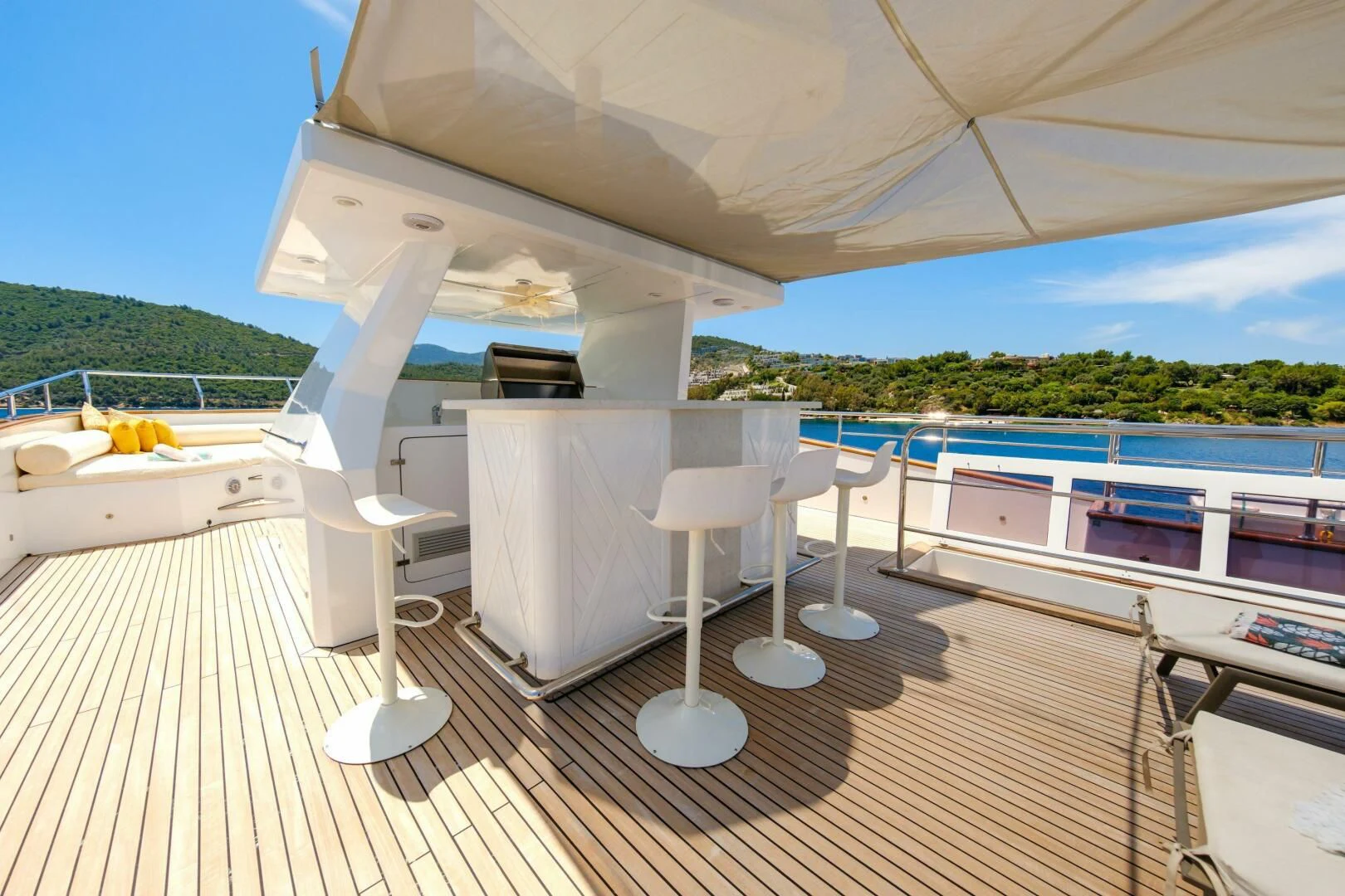 a deck with a pool and a deck aboard OTTAWA IV Yacht for Sale