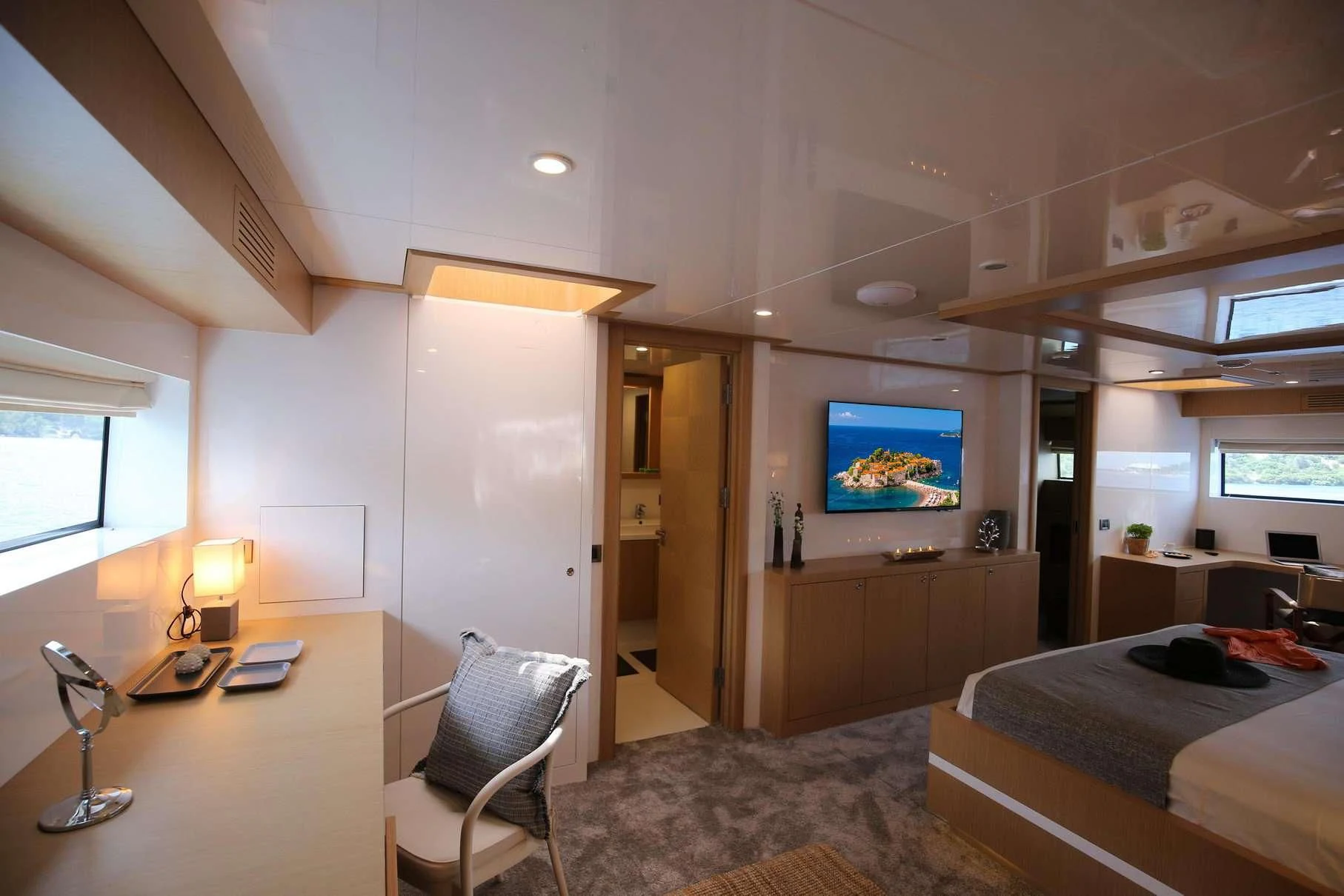 a bedroom with a tv on the wall aboard OTTAWA IV Yacht for Sale