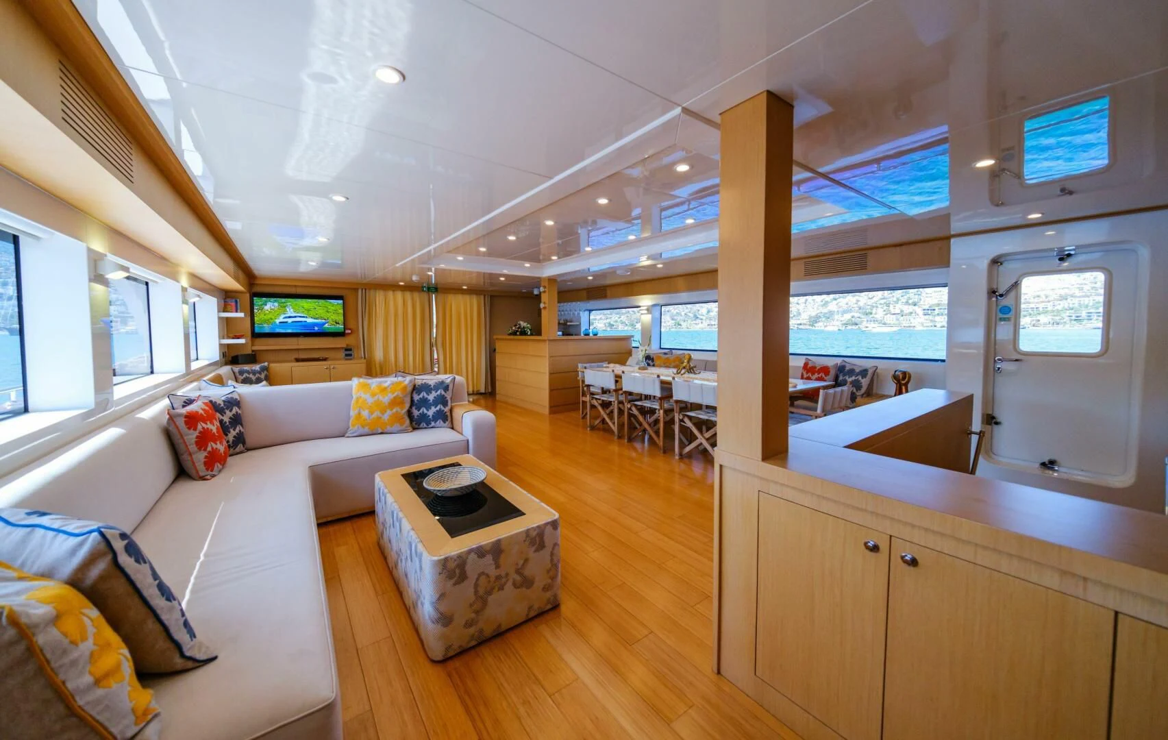 a living room with a large window aboard OTTAWA IV Yacht for Sale